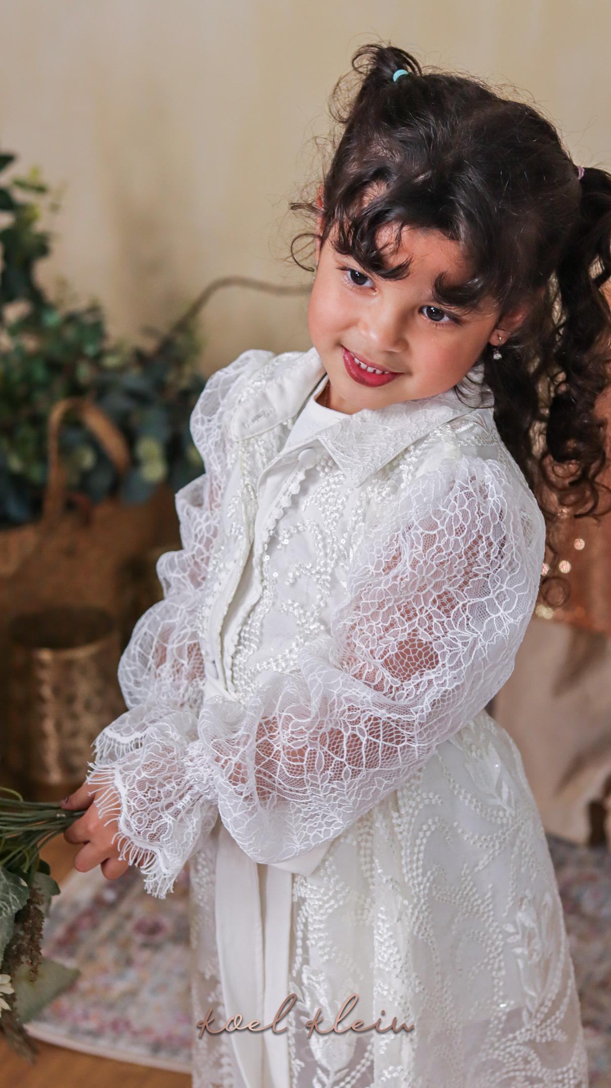 White Lace — Delicate lace dress with ruffled detail